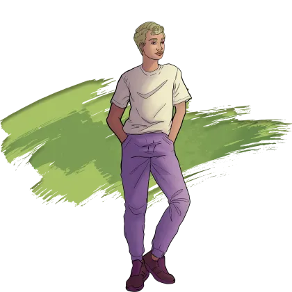 A young person stands smiling with their hands in their pockets.