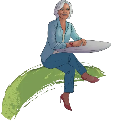 A woman sits at a table, ready to listen.